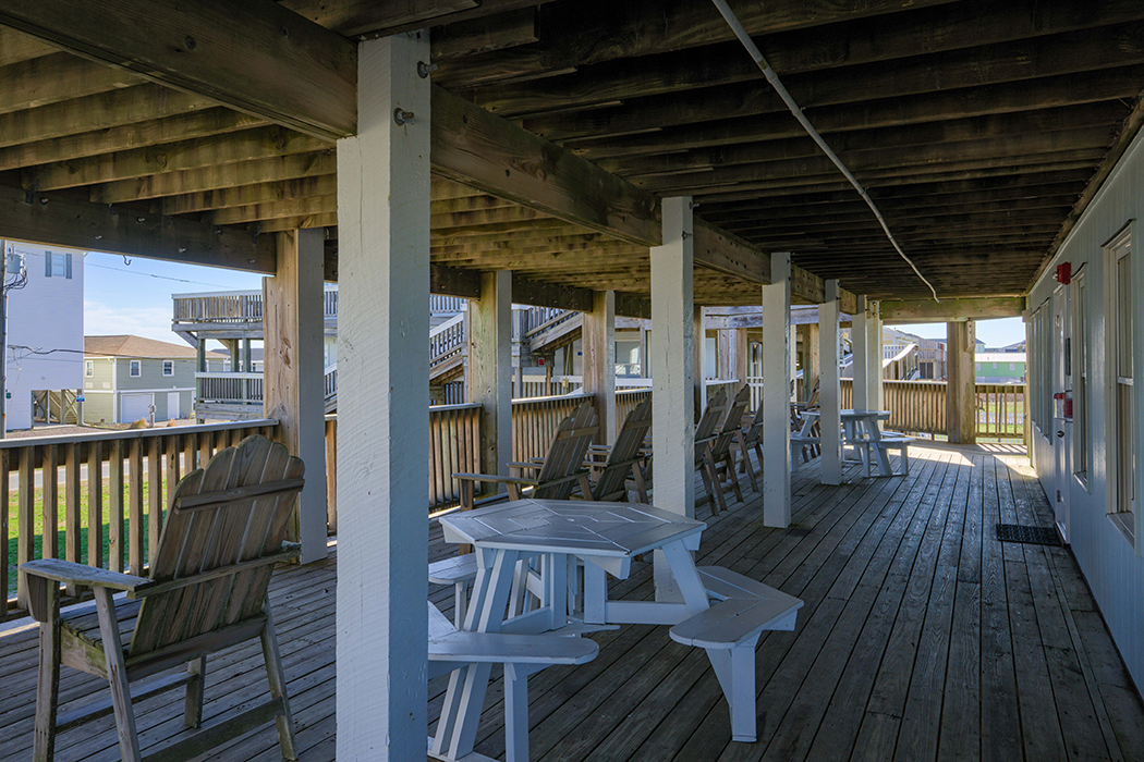 Chairs and eating tables on one of our many deck areas